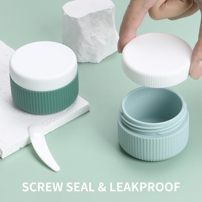 ME.FAN Travel Containers for Toiletries, TSA Approved 1.5 oz Silicone Cream Jars, Leak-proof Travel Size Containers, Travel Accessories with Lid for Cosmetic Face Hand 4 Pack White Lid - Blue