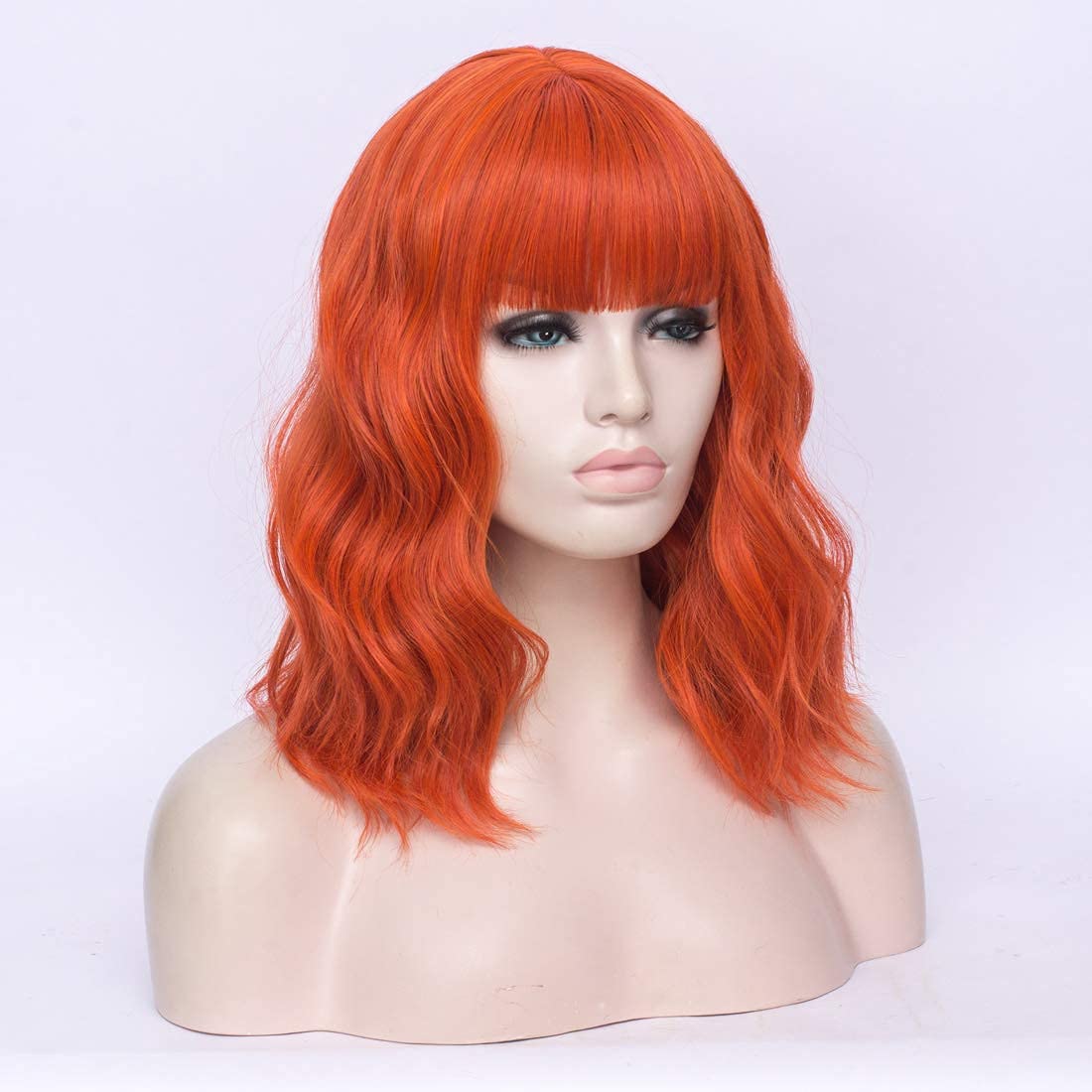 WGPFWIG Women's Light Orange Wig Short Curly Wavy Wig Shoulder Length Flat Bangs Wig For Women Girl Cosplay Party Halloween Wig Cap Included (Light Orange)