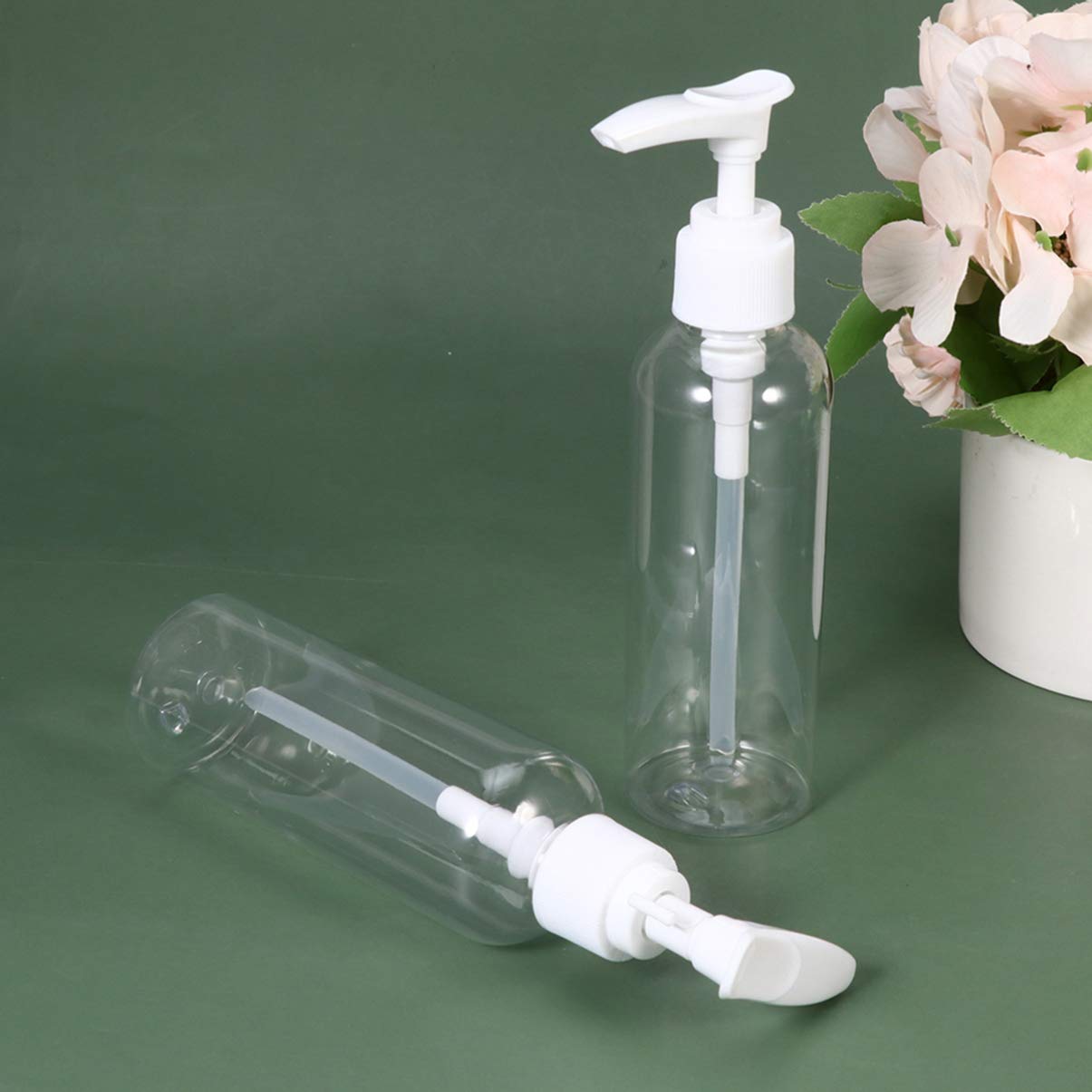 FOMIYES 10pcs Small Empty Plastic Pump Bottles Dispenser Portable Refillable Soap Shampoo Lotion Containers for Home Travel Outdoor Camping 100ml Transparent
