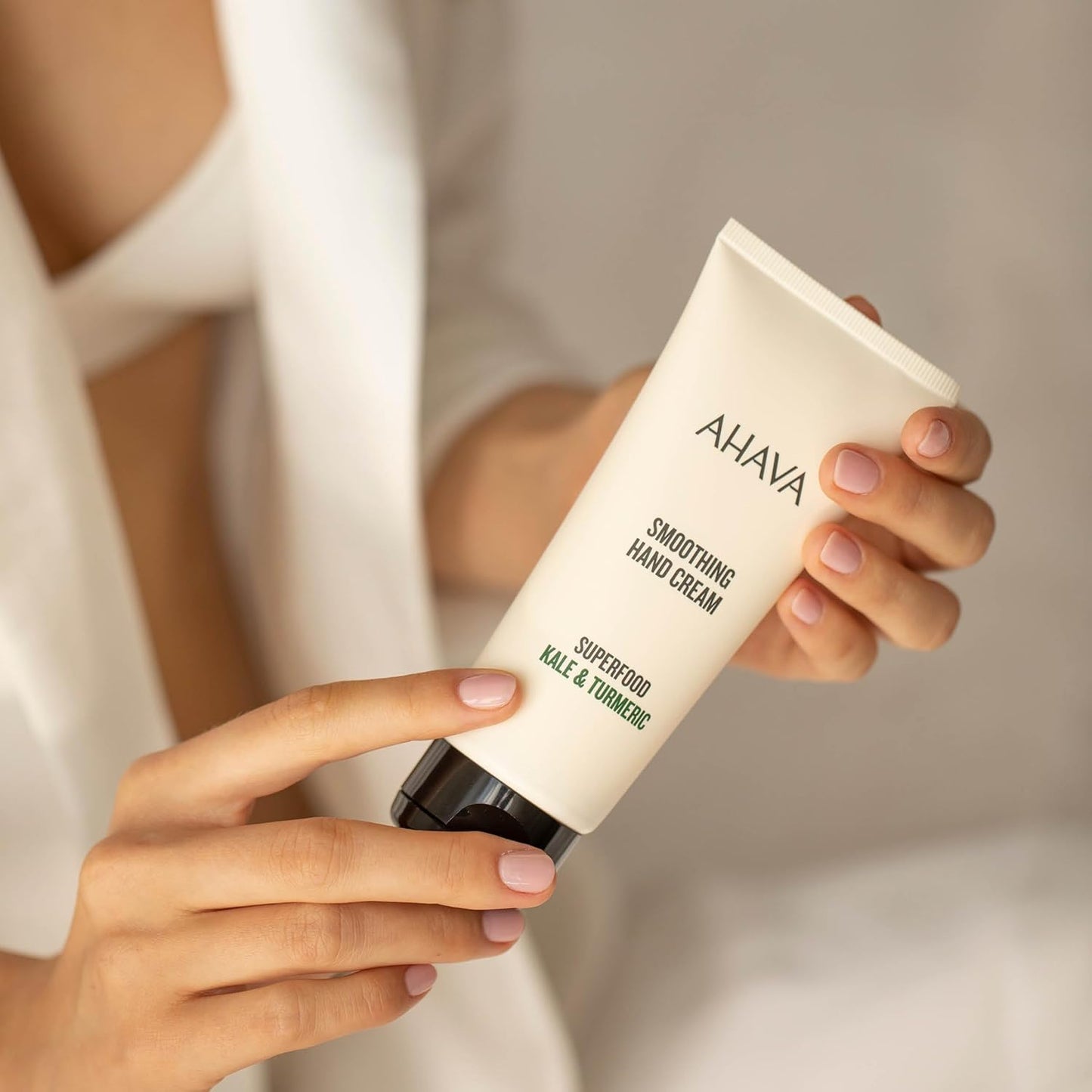 AHAVA Dead Sea Water Mineral Hand Cream - Hand Moisturizer For Dry Cracked Hands, Light & Fast Absorbing, Enriched with Exclusive blend Osmoter, Smoothing Witch Hazel & Soothing Allantoin