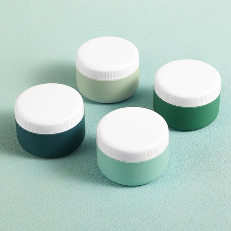 Kuangre Travel Containers for Toiletries, Silicone Cream Jars BPA Free, TSA Approved 2oz Travel Size Containers, Leak-proof Travel Essentials with Lid for Cosmetic Face Hand Body Cream (4 Pack)