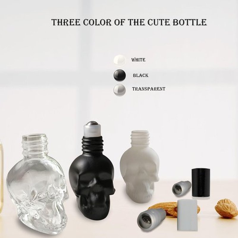 MINELEVEN 7 pcs Set 10ml Mini Skull Glass Oil Roller Bottles Leakproof Essential Oils Bottle for Storage and Travel (transparent)