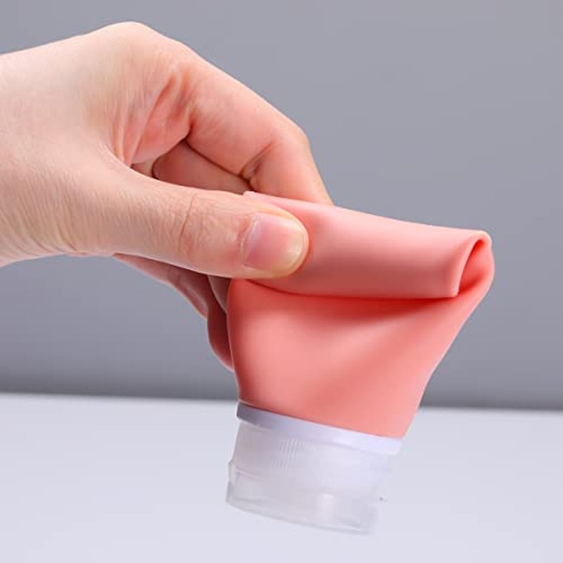 Silicone Travel Bottles,4 Pack 3.4oz Leak Proof Liquid Squeezable Refillable Portable Travel Accessories/Cosmetic Containers,BPA Free,Travel Size Bottles for Toiletries Shampoo Conditioner Lotion