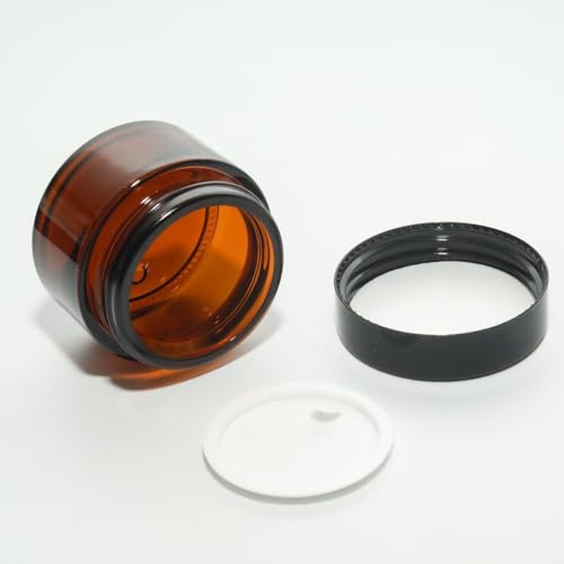 YUYUDEHM 4 Pack 1oz Amber Glass Jars with Lids, 30ml Reusable Empty Round Container for Creams, Lotion, Cosmetic