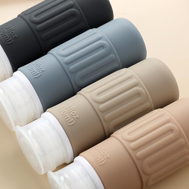 Mrsdry Travel Bottles for Toiletries, BPA Free Leak Proof reusable Silicone Bottles, TSA Approved 3oz Travel Size Bottles, Travel Accessories for Shampoo Soap Liquids with Toiletry Bag (4 Pack)
