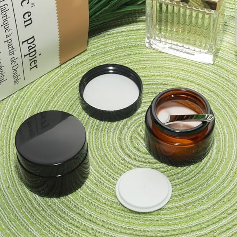 YUYUDEHM 4 Pack 1oz Amber Glass Jars with Lids, 30ml Reusable Empty Round Container for Creams, Lotion, Cosmetic