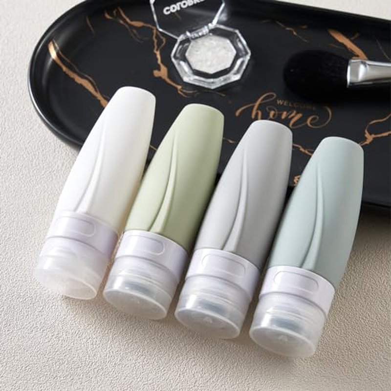 INSFIT Portable Travel Bottles TSA Approved, 2oz Leak Proof BPA Free Silicone Cosmetic Travel Size Toiletry Containers, Squeezable Silicone Tubes, Refillable Bottles for Shampoo 4 Pack Brown