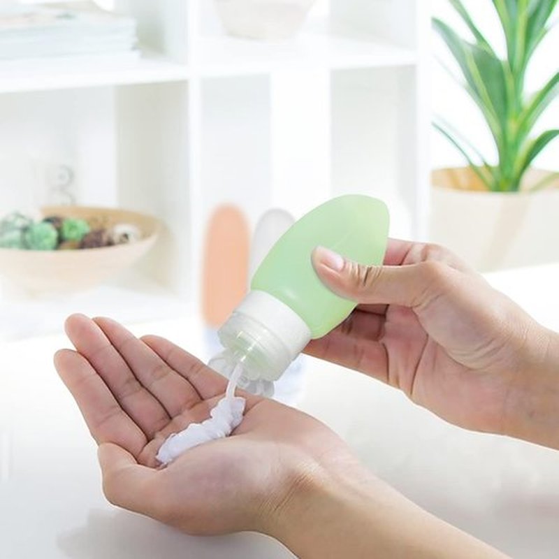 Dot&Dot Leak Proof Travel Bottles for Toiletries - 4 Pack Silicone Travel Toiletry Bottles - Travel Shampoo and Conditioner Bottles with TSA Quart Bag - 1 oz Travel Size Bottles