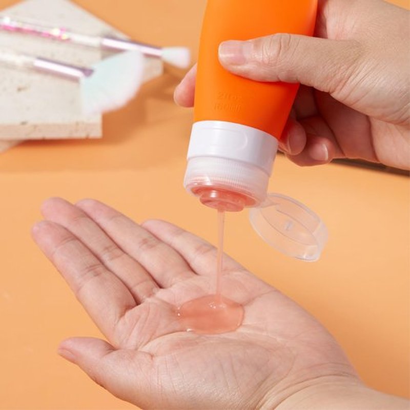 INSFIT Travel Bottles for Toiletries, TSA Approved 2oz Travel Size Bottles Leak Proof Travel Containers for Toiletries, BPA Free Refillable Travel Accessories for Shampoo Body Wash Liquids Orange