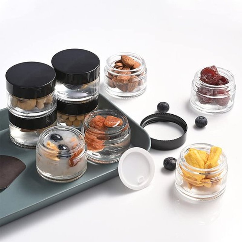 4 Pack 1oz Small Glass Containers with Lids, Glass Jars with Black Lids & Stickers, Mini Reusable Empty Container for Creams, Lotion, Cosmetic
