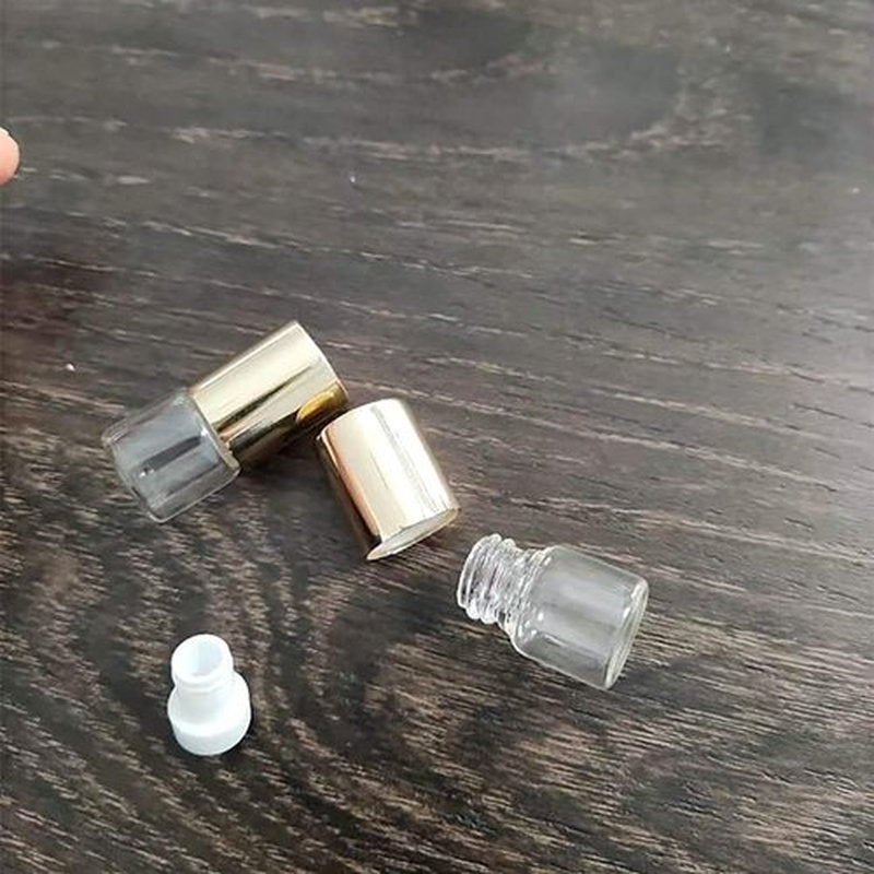UUYYEO 12 Pcs 1ml Mini Glass Roll on Bottles Roller Bottles Refillable Essential Oil Bottles Aromatherapy Bottles Sample Vials Container Golden