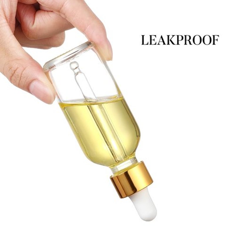 AOZITA 4 Pcs, 1 oz Golden Cap Clear Dropper Bottles (30ml) with 1 Funnel & 4 Labels - Glass Tincture Bottles with Eye Droppers - Leakproof Essential Oil Bottles for Health, Personal Care & Beauty