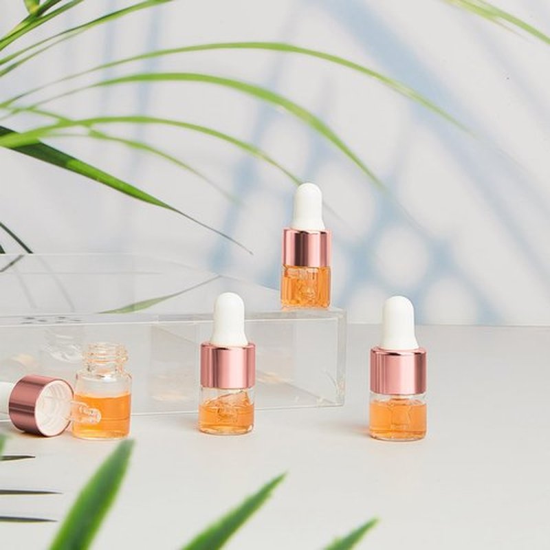 Didaey 100 Pcs Mini Glass Dropper Bottle Bulk, 1 ml Rose Gold Clear Essential Oil Dropper Bottles Small Tincture Empty Bottles Sample Containers Perfume Liquid Vials with Cap for Traveling