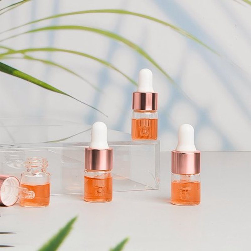Didaey 100 Pcs Mini Glass Dropper Bottle Bulk, 2 ml Rose Gold Clear Essential Oil Dropper Bottles Small Tincture Empty Bottles Sample Containers Perfume Liquid Vials with Cap for Traveling