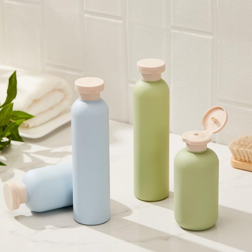 Qeuly Squeeze Bottles with Pump Dispenser and Flip Cap, 8.8 oz Refillable Travel Containers for Toiletries, Plastic Travel Shampoo and Conditioner Bottles (Green 260)