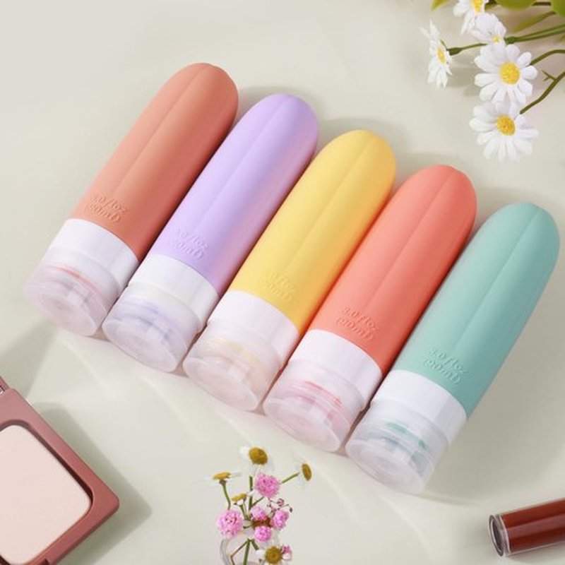 GLAMFIELDS Travel Bottles for Toiletries,3oz Travel Size Containers TSA Approved Leak Proof Silicone for Shampoo,Conditioner,Easy to Squeeze and Portable, Essentials for Traveling (5 Pack) Orange
