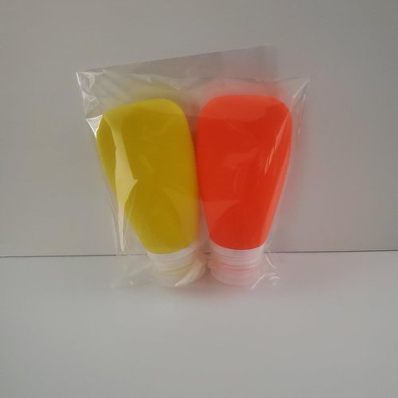 LYOB Travel Bottles for Toiletries, TSA Approved 3oz Leak Proof Silicone Refillable Squeeze Travel Size Containers BPA Free for Cleansers, Lotions, Shampoo 2pk (Orange,Yellow) Stocking Stuffers