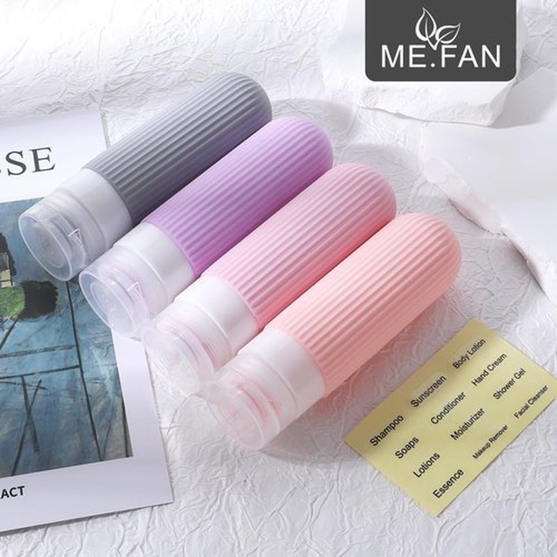 ME.FAN Travel Bottles for Toiletries, TSA Approved 3oz Silicone Travel Size Containers/Portable Split Bottle, Travel Accessories for Conditioner, Shampoo, Lotion - 4 Pack Purple