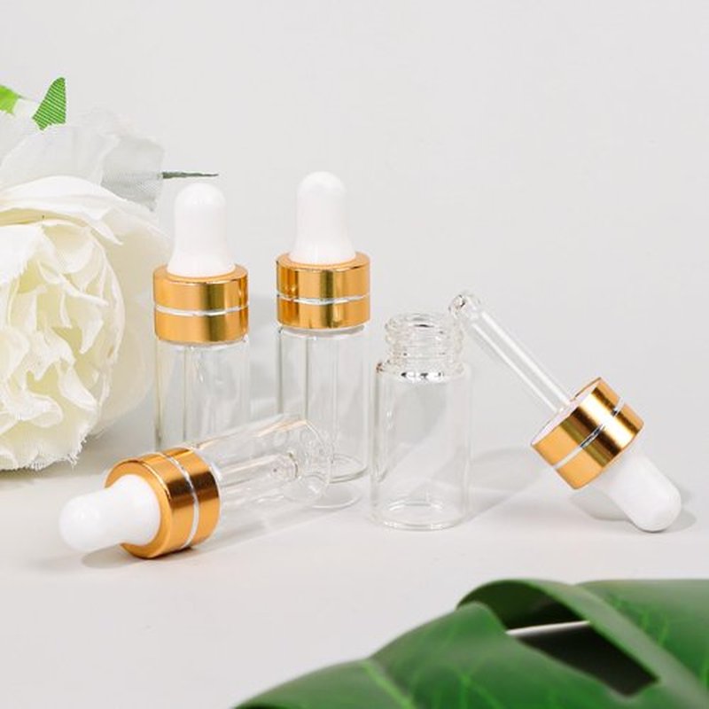 Comrzor 50 Pack 3ml Clear Glass Dropper Bottles with 2 Pcs Plastic Droppers, Mini Sample Dropper Bottles for Essential Oils Perfume Cosmetic Liquid, Empty Travel Sample Vials with Gold Cap