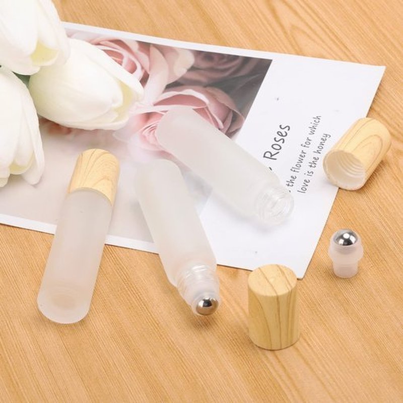 Tbestmax 12 Pcs 10 ml Glass Roll on Bottle with Lid for Essential Oils, Refillable Clear Perfume Sample Bottles with Stainless Steel Roller Ball