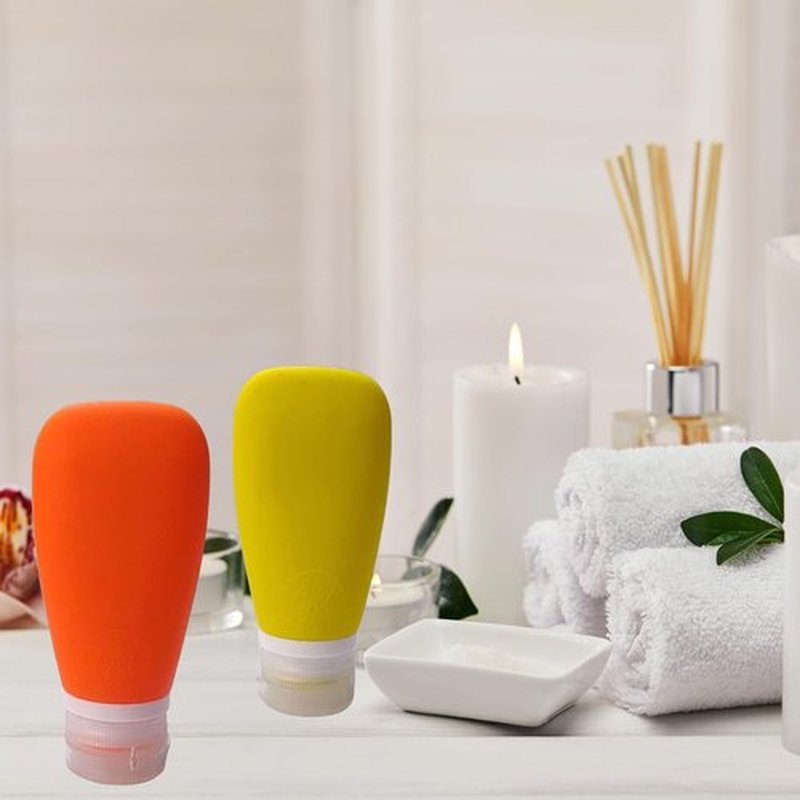 LYOB Travel Bottles for Toiletries, TSA Approved 3oz Leak Proof Silicone Refillable Squeeze Travel Size Containers BPA Free for Cleansers, Lotions, Shampoo 2pk (Orange,Yellow) Stocking Stuffers