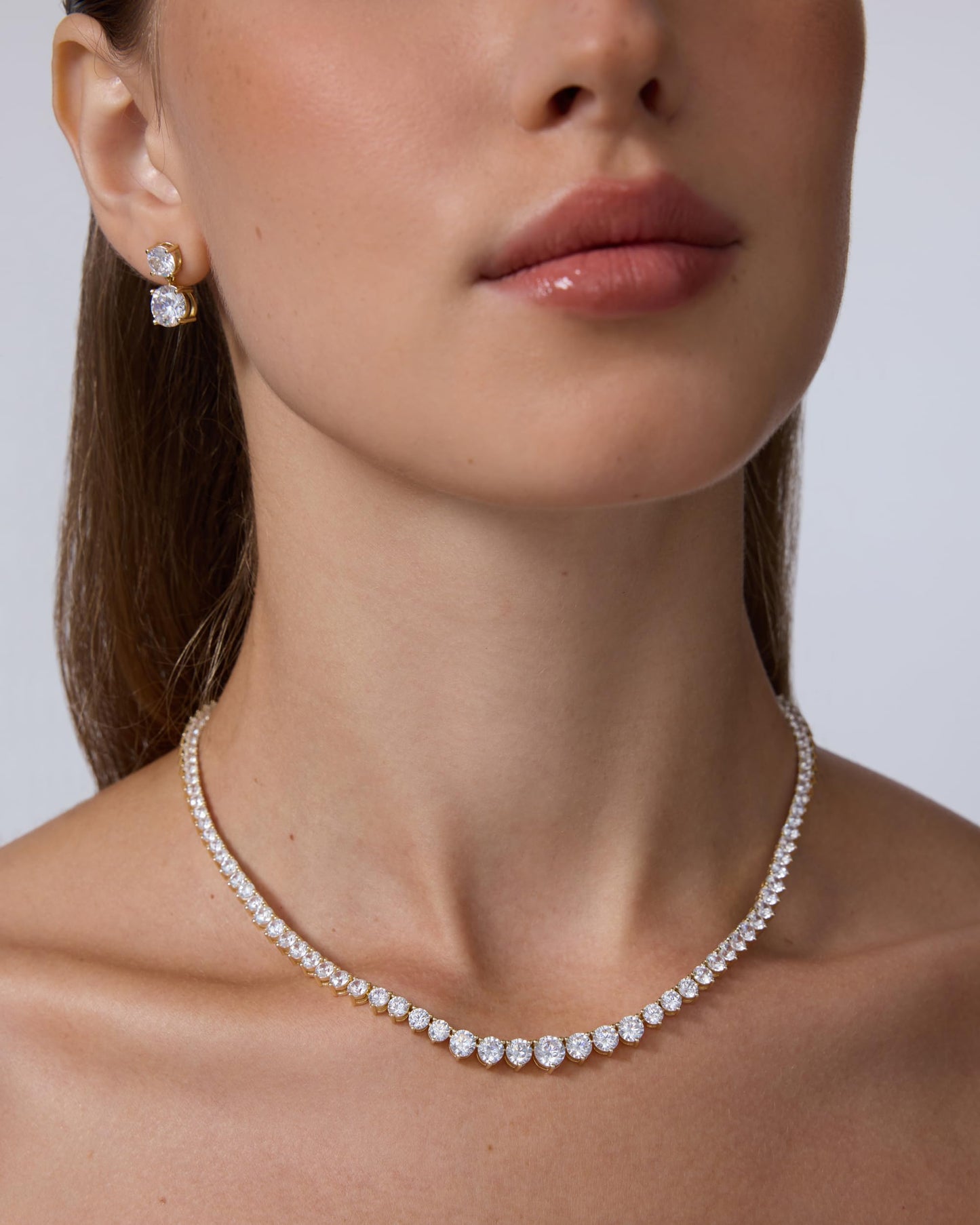 PAVOI 14K Yellow Gold Plated Graduated Tennis Necklaces for Women - Cubic Zirconia Tennis Necklace for Brides & Bridesmaids - Simulated Diamond Chain Trendy Wedding Jewelry - 16 Inches