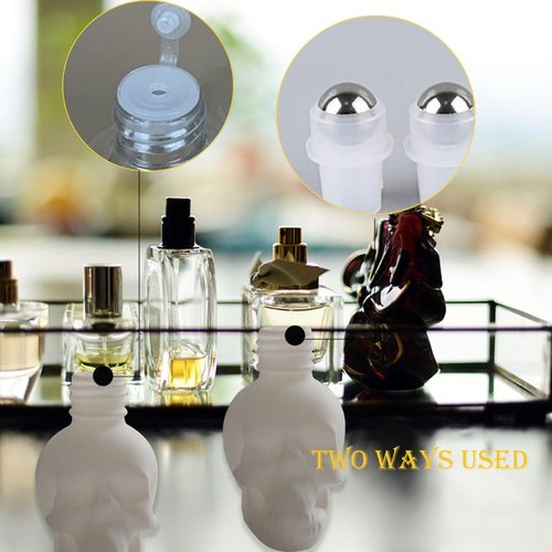 MINELEVEN 7 pcs Set 10ml Mini Skull Glass Oil Roller Bottles Leakproof Essential Oils Bottle for Storage and Travel (white)