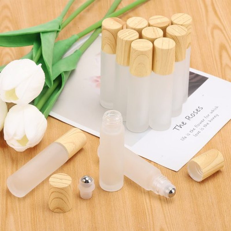 Tbestmax 12 Pcs 10 ml Glass Roll on Bottle with Lid for Essential Oils, Refillable Clear Perfume Sample Bottles with Stainless Steel Roller Ball