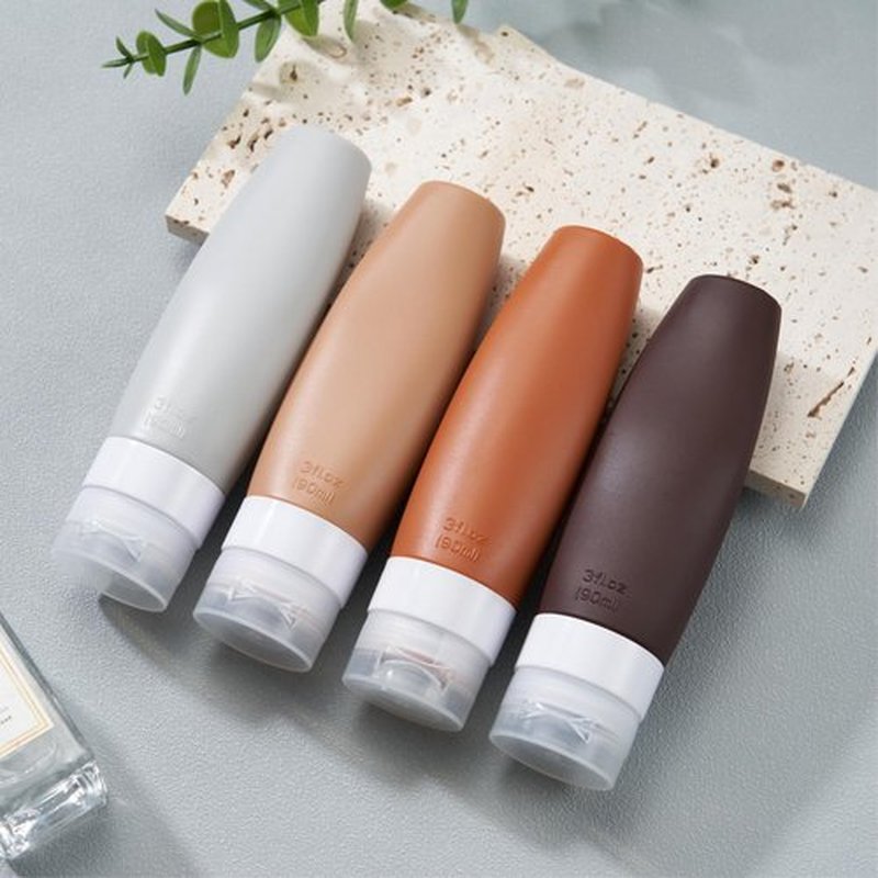 INSFIT Portable Travel Bottles TSA Approved, 3oz Leak Proof BPA Free Silicone Cosmetic Travel Size Toiletry Containers, Squeezable Silicone Tubes, Refillable Bottles for Shampoo 4 Pack Brown
