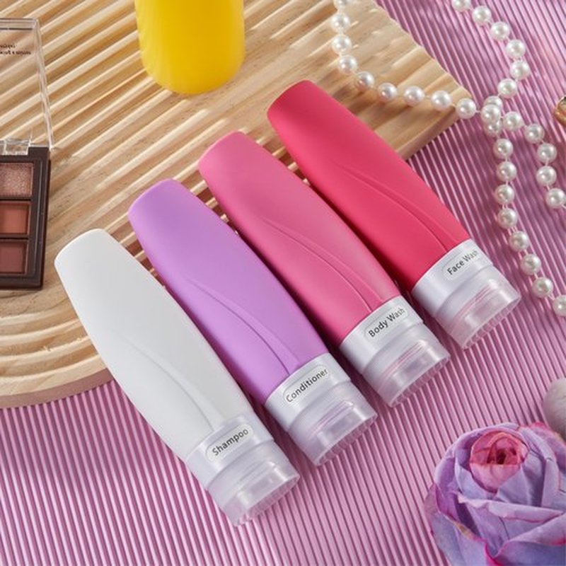INSFIT Portable Travel Bottles TSA Approved, 3oz Leak Proof BPA Free Silicone Cosmetic Travel Size Toiletry Containers, Squeezable Silicone Tubes, Refillable Bottles for Shampoo 4 Pack Pink
