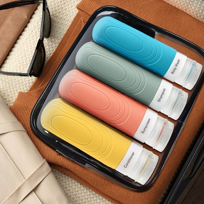 GLAMFIELDS TSA Approved Travel Bottles for Toiletries, 3oz Size Leak Proof Silicone Containers for Shampoo, Conditioner,Easy to Squeeze and Portable, Essentials for Traveling (4 Pack) Yellow