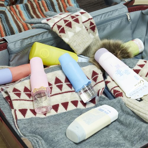 NELSHP Travel Bottle Covers,10 Pack Silicone Travel Size Container Sleeves,Stretching Travel Accessories for Shampoo Lotion Conditioner Wash Body Bottles