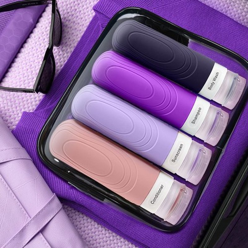 GLAMFIELDS Travel Bottles for Toiletries TSA Approved, 3oz Size Leak Proof Silicone Travel Containers for Shampoo, Lotion,Easy to Squeeze Portable, Essentials for Traveling (4 Pack) Purple