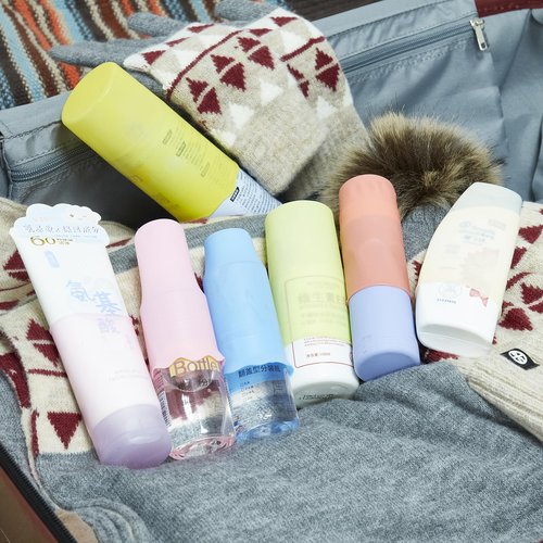 NELSHP Travel Bottle Covers,10 Pack Silicone Travel Size Container Sleeves,Stretching Travel Accessories for Shampoo Lotion Conditioner Wash Body Bottles